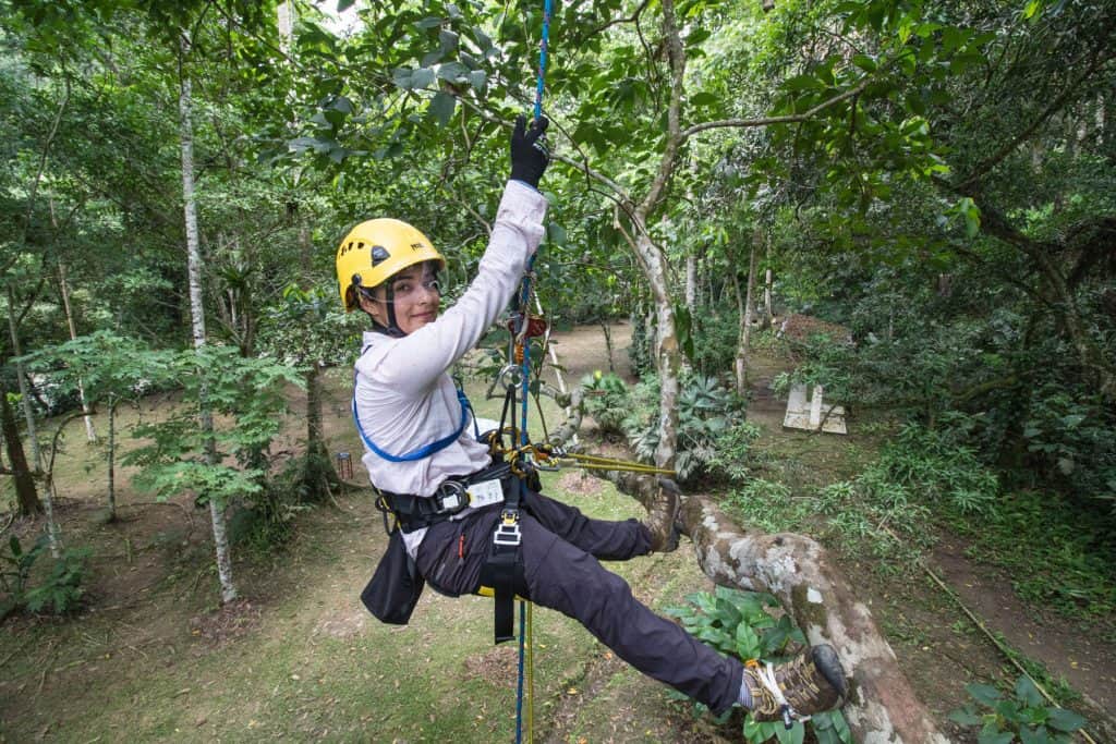 Textbook photo for the definition of “climber training”: Luz Adriana Molina limbwalking and pushing beyond her limits. Photo © David L. Anderson